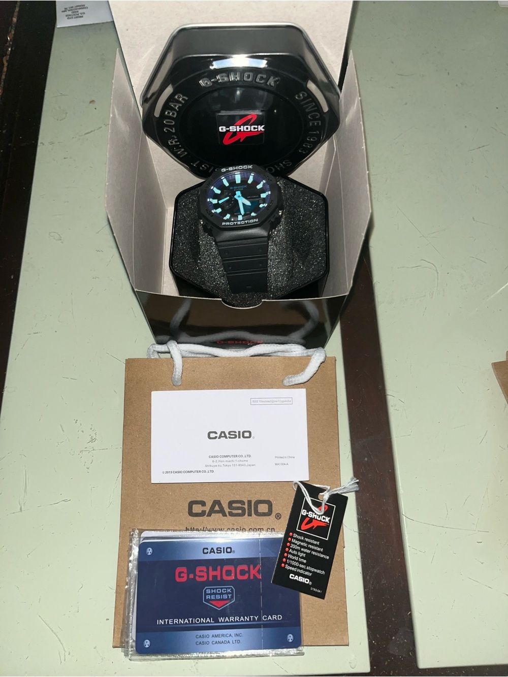 Casio G-Shock Black Watch with Teal Accents
